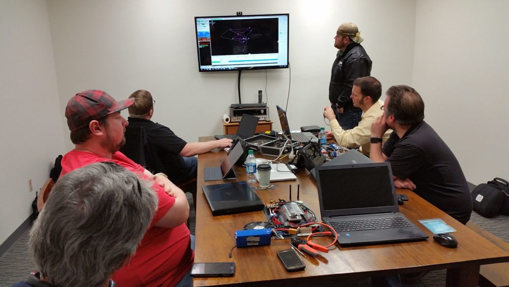 Delta Zee team collaborating in a design review